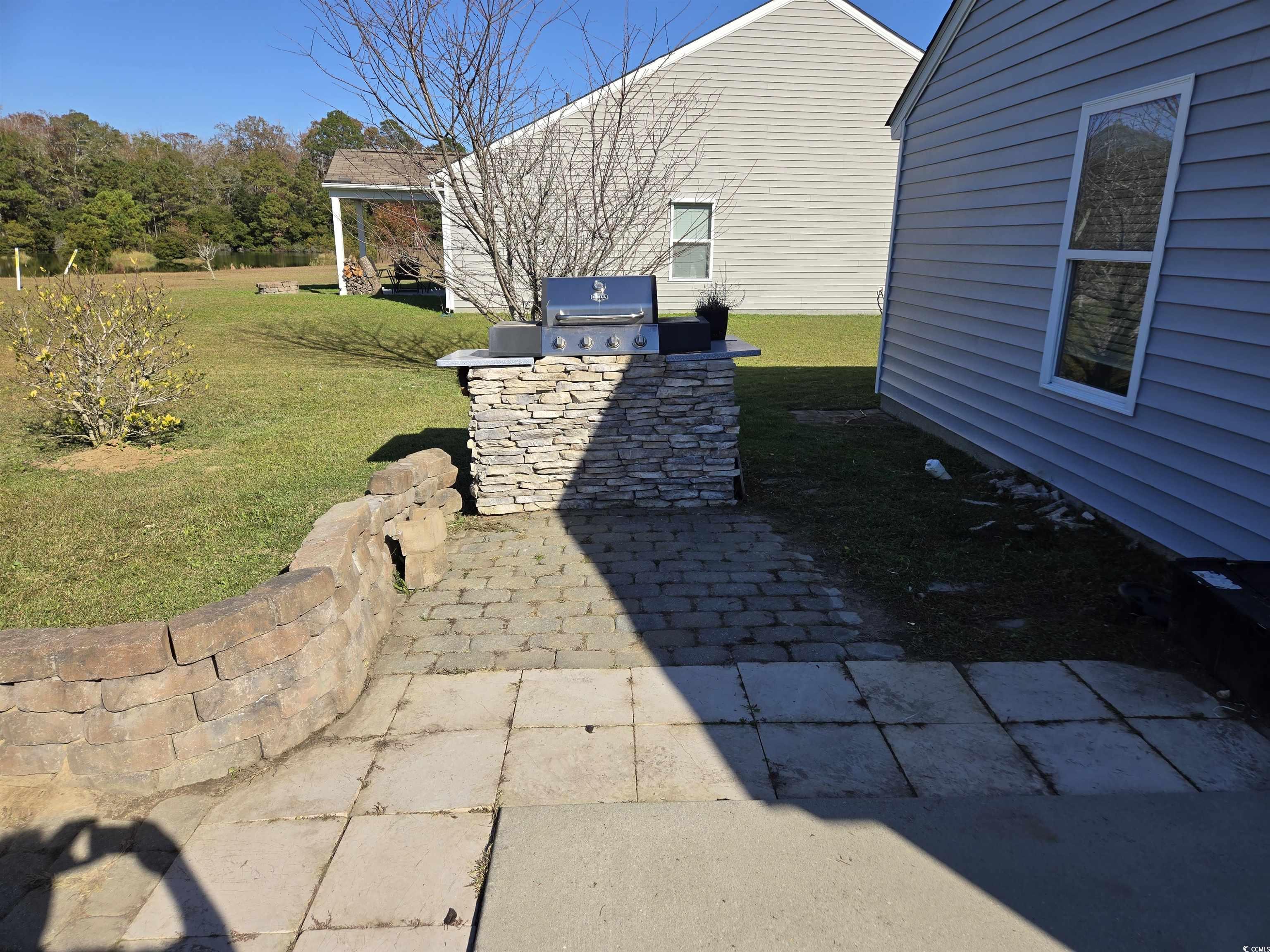 1245 Pine Ridge Street Conway, SC 29527 - Photo 18 of 28 View of patio / terrace featuring an outdoor kitchen