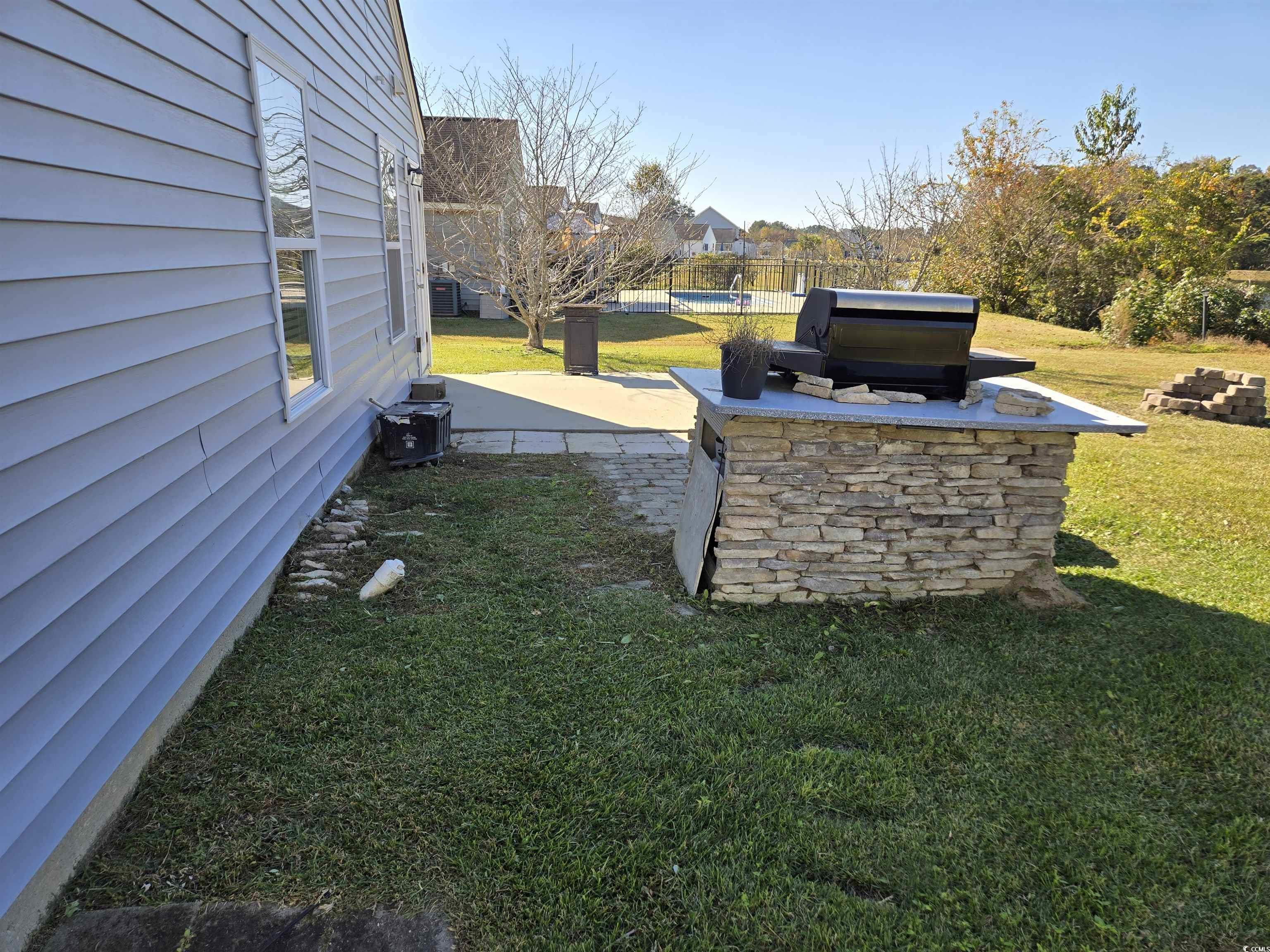 1245 Pine Ridge Street Conway, SC 29527 - Photo 22 of 28 View of yard with a patio area