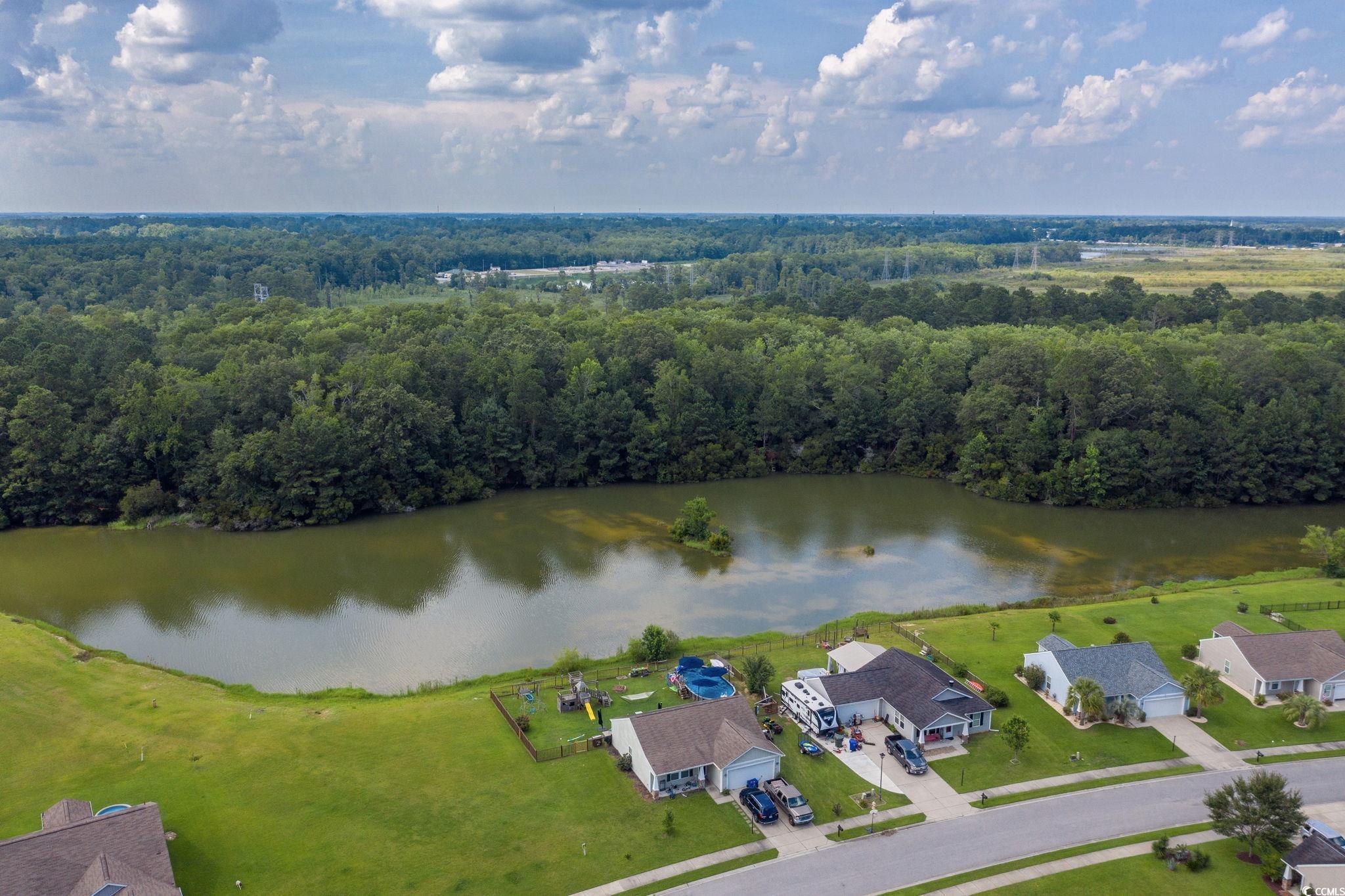 1245 Pine Ridge Street Conway, SC 29527 - Photo 28 of 28 Aerial view of a large body of water and a heavily wooded area