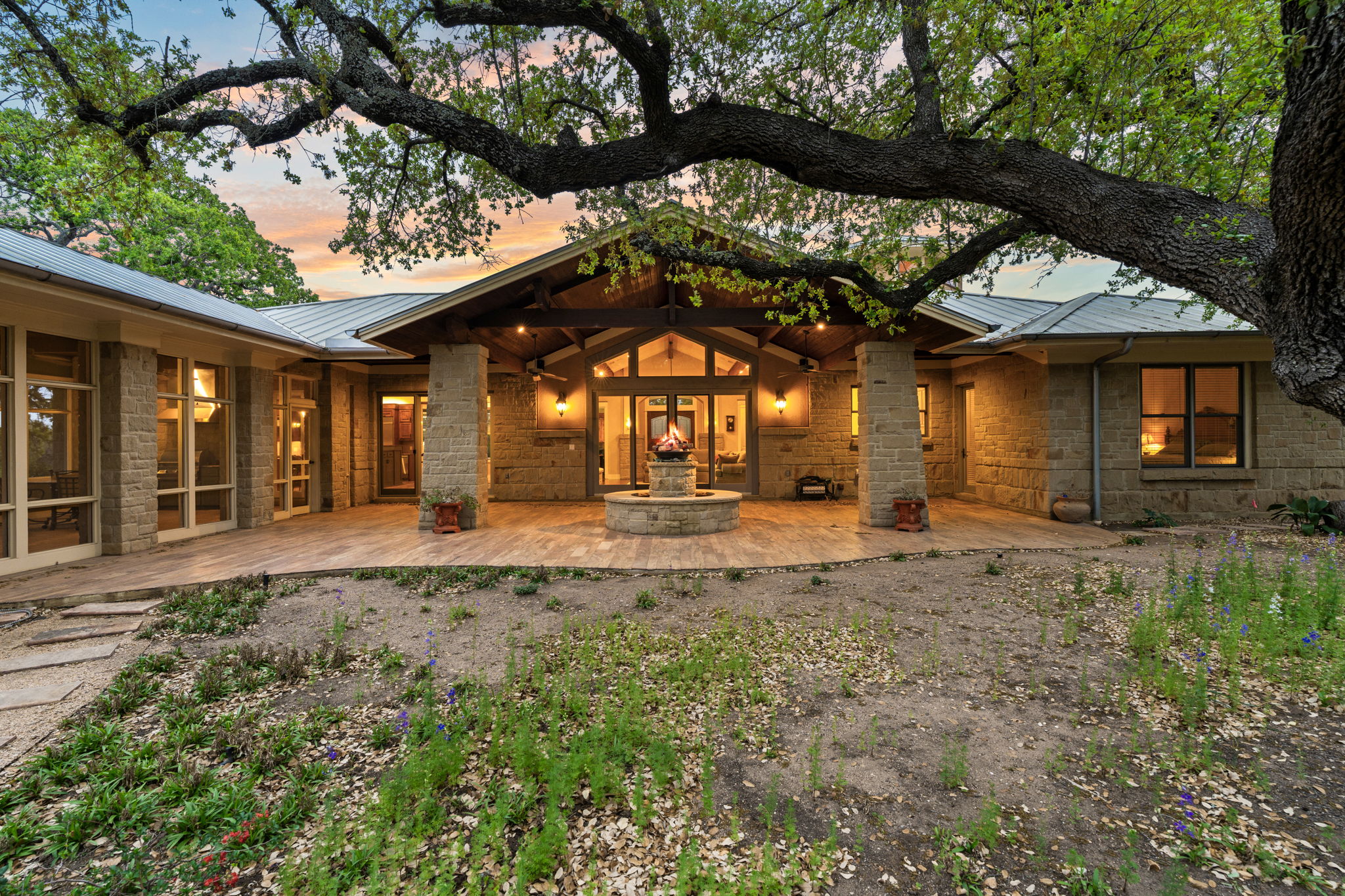 23426 Oscar Road Spicewood, TX 78669 - Photo 36 of 40 View of the back patio of the main house.