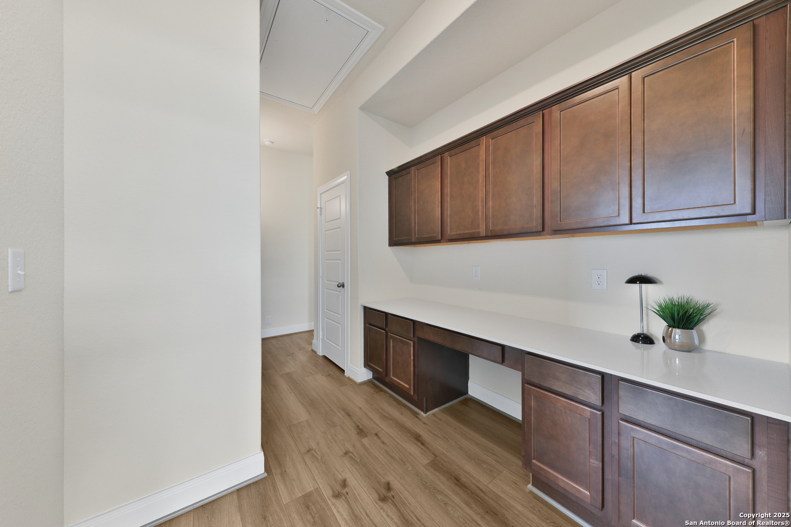 195 Piper Street Castroville, TX 78009 - Photo 24 of 47 a kitchen with a sink and cabinets