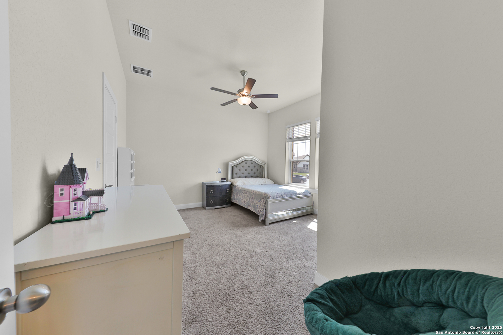 195 Piper Street Castroville, TX 78009 - Photo 28 of 47 a living room with furniture and a ceiling fan