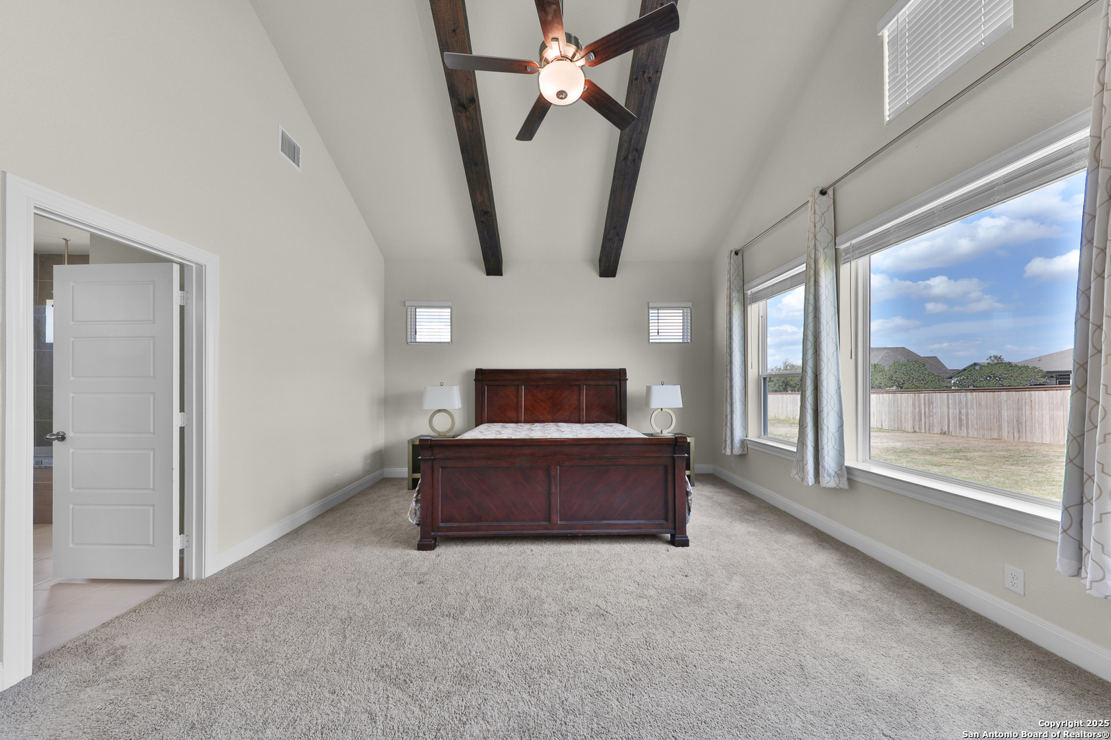 195 Piper Street Castroville, TX 78009 - Photo 30 of 47 a living room with furniture and a large window