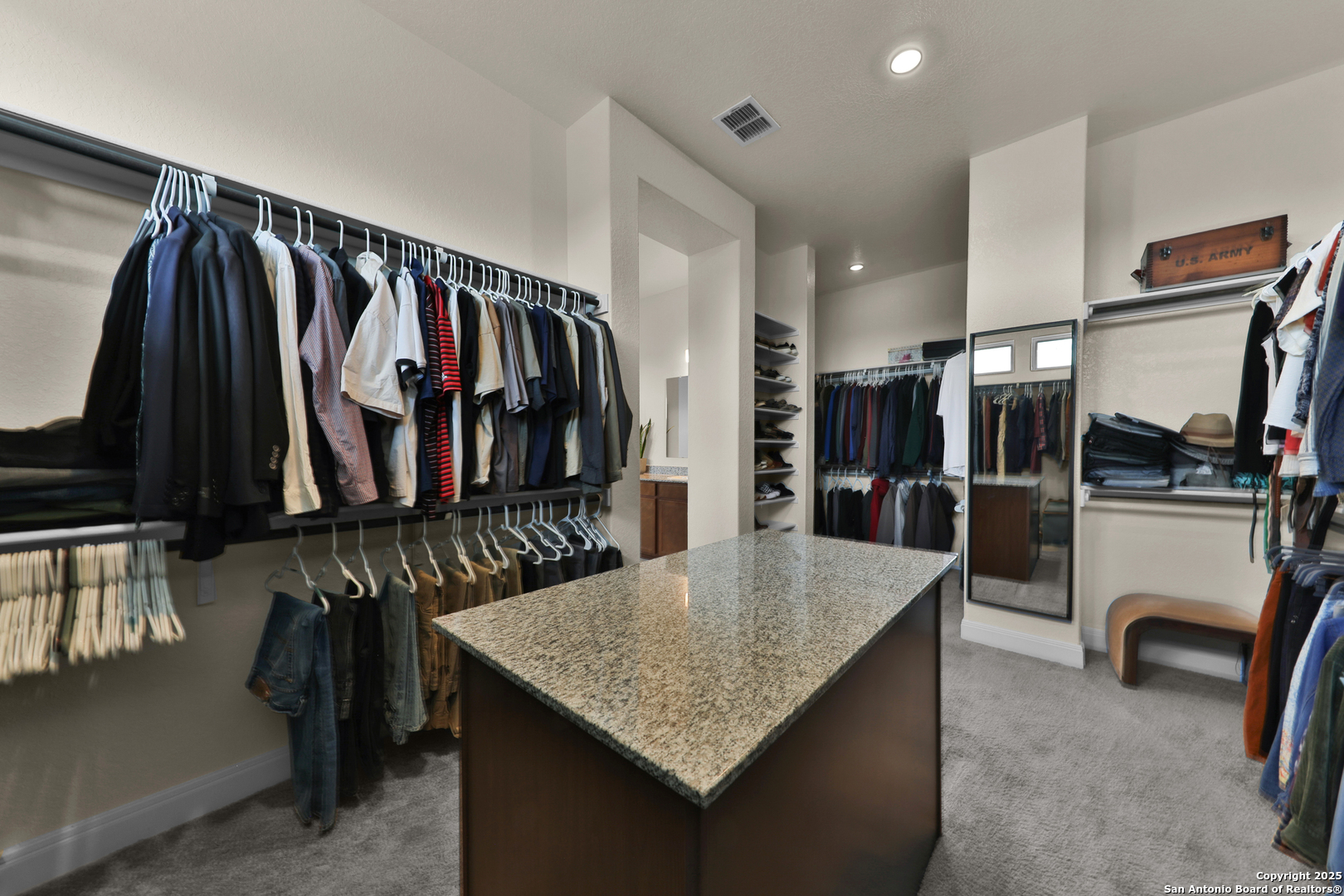 195 Piper Street Castroville, TX 78009 - Photo 39 of 47 a kitchen with stainless steel appliances granite countertop a refrigerator a stove and a sink