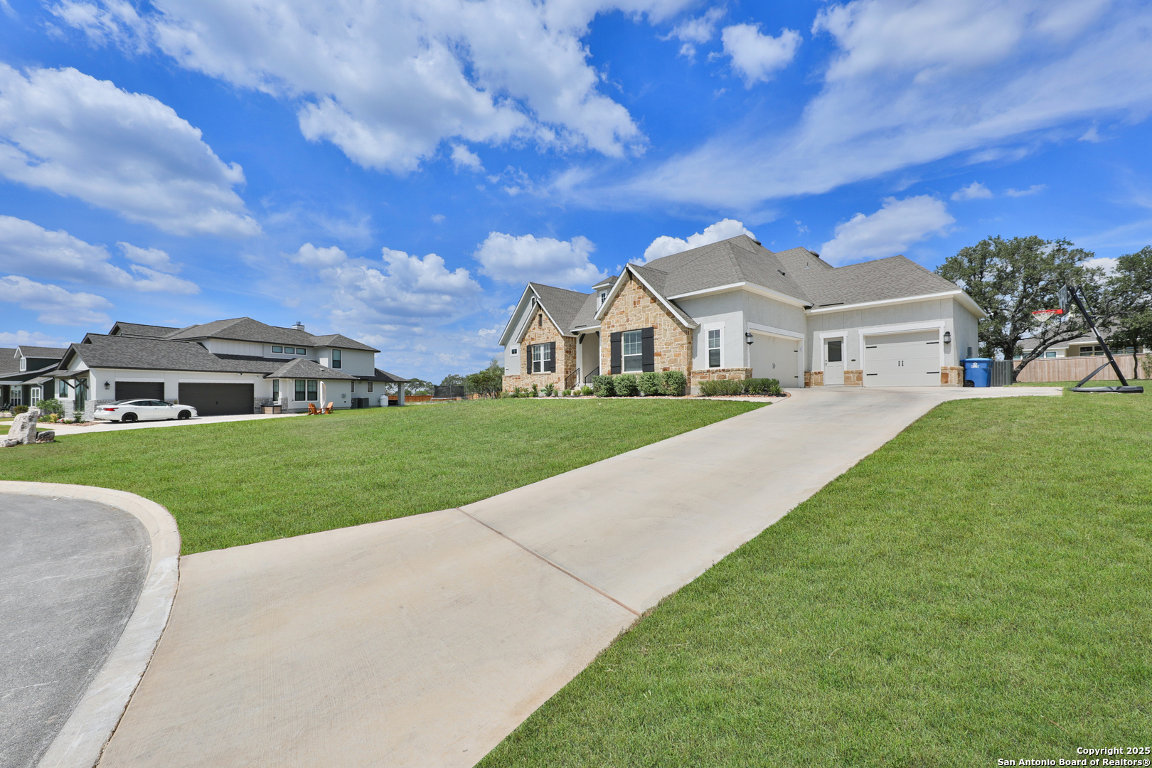 195 Piper Street Castroville, TX 78009 - Photo 4 of 47 a front view of house with yard and green space