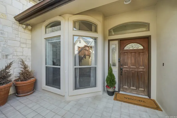 a view of a entryway door front of house