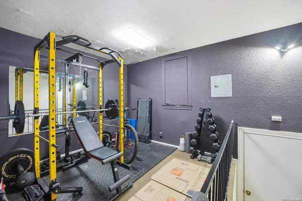 a view of a room with gym equipment