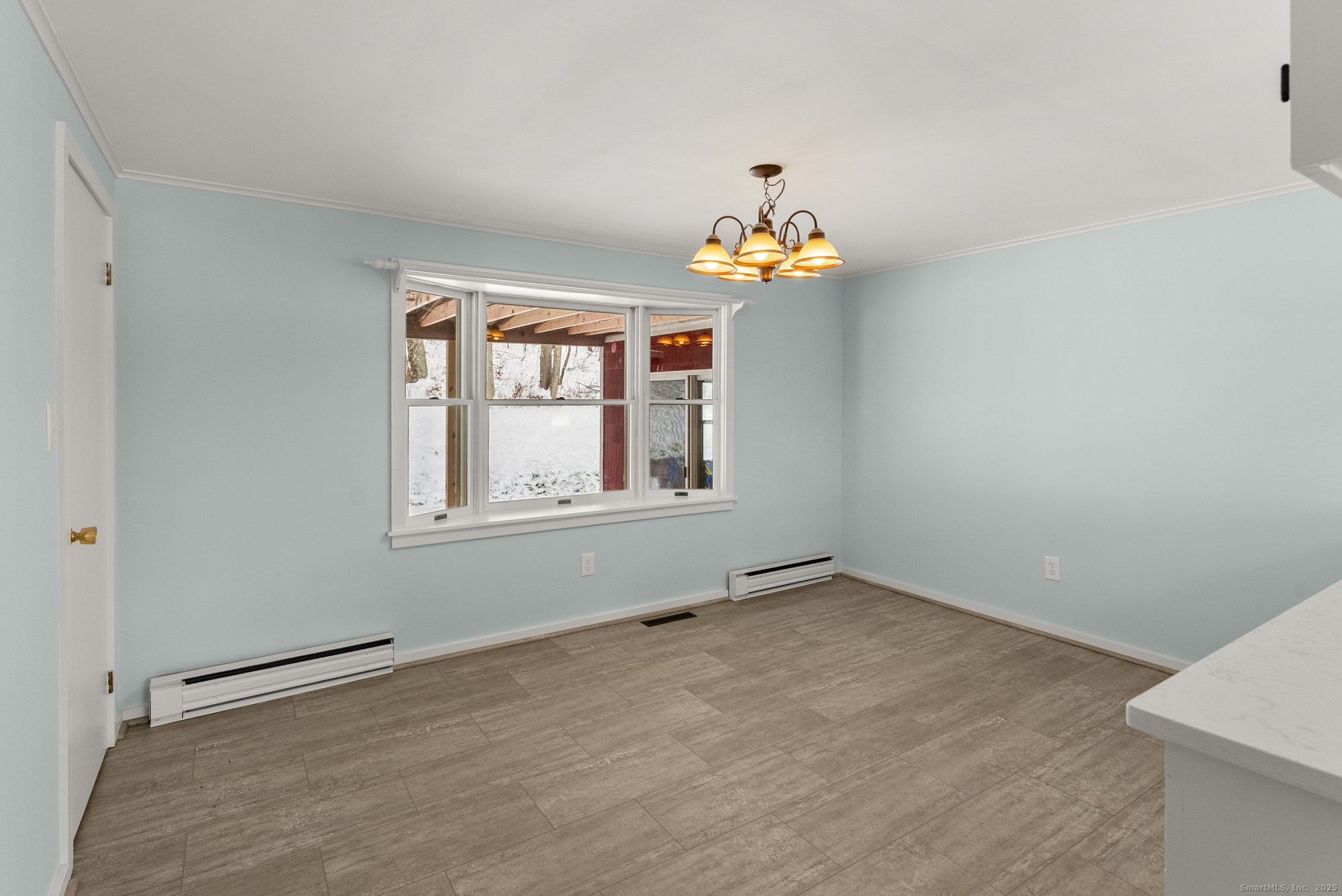 52 B Fuller Mountain Road Kent, CT 06757 - Photo 15 of 25 an empty room with windows and painted walls