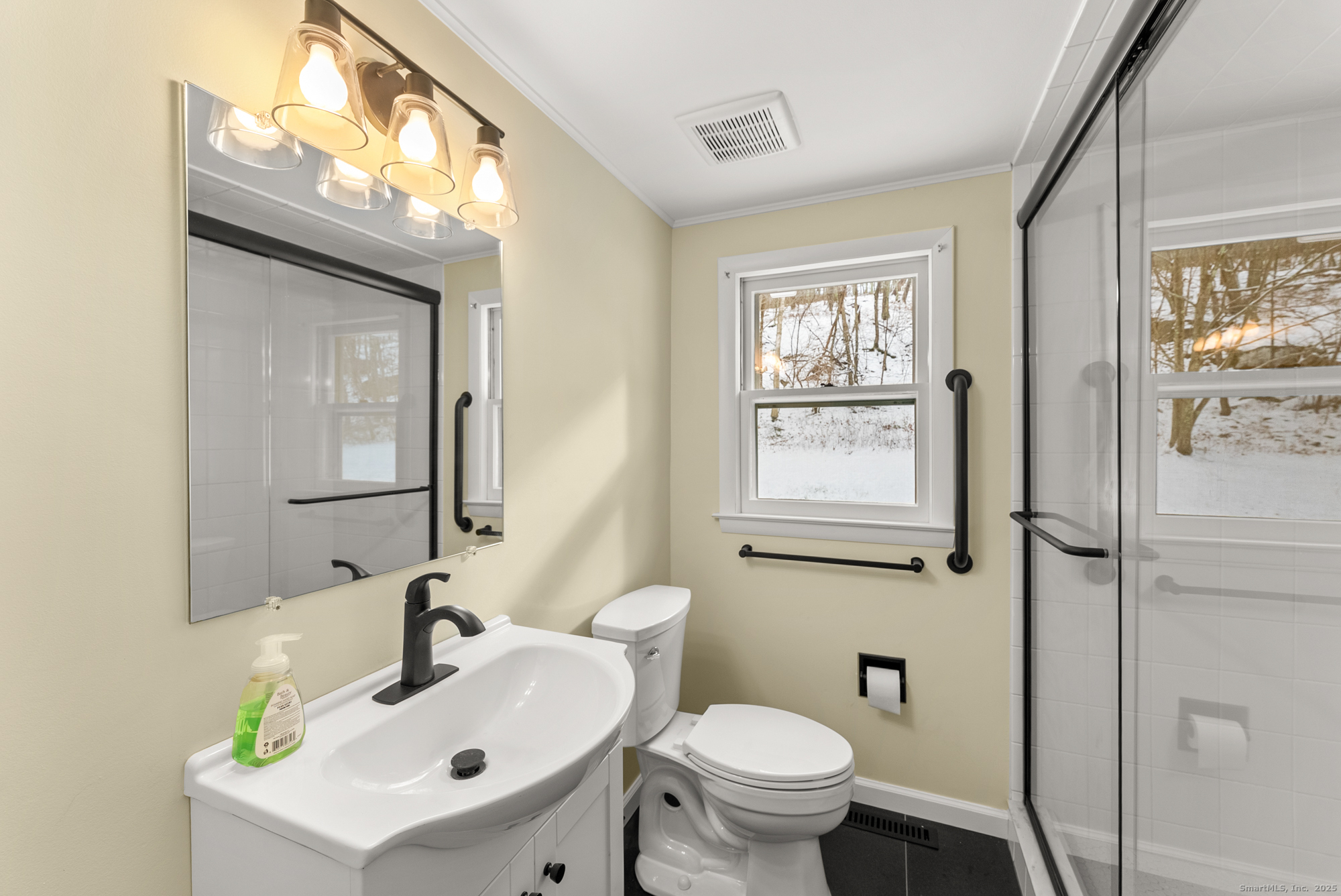 52 B Fuller Mountain Road Kent, CT 06757 - Photo 20 of 25 a bathroom with a sink mirror and toilet