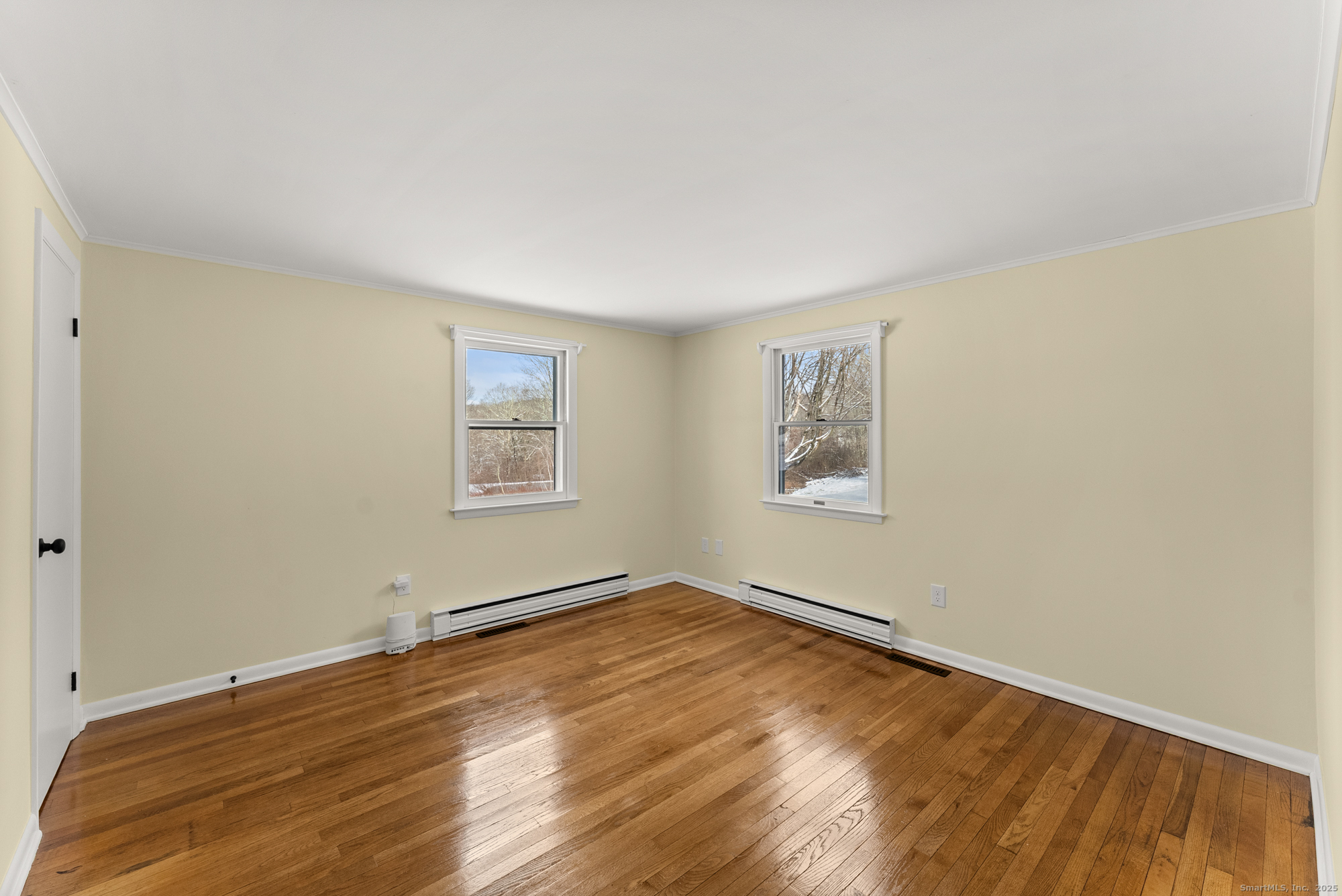 52 B Fuller Mountain Road Kent, CT 06757 - Photo 21 of 25 a view of empty room with wooden floor