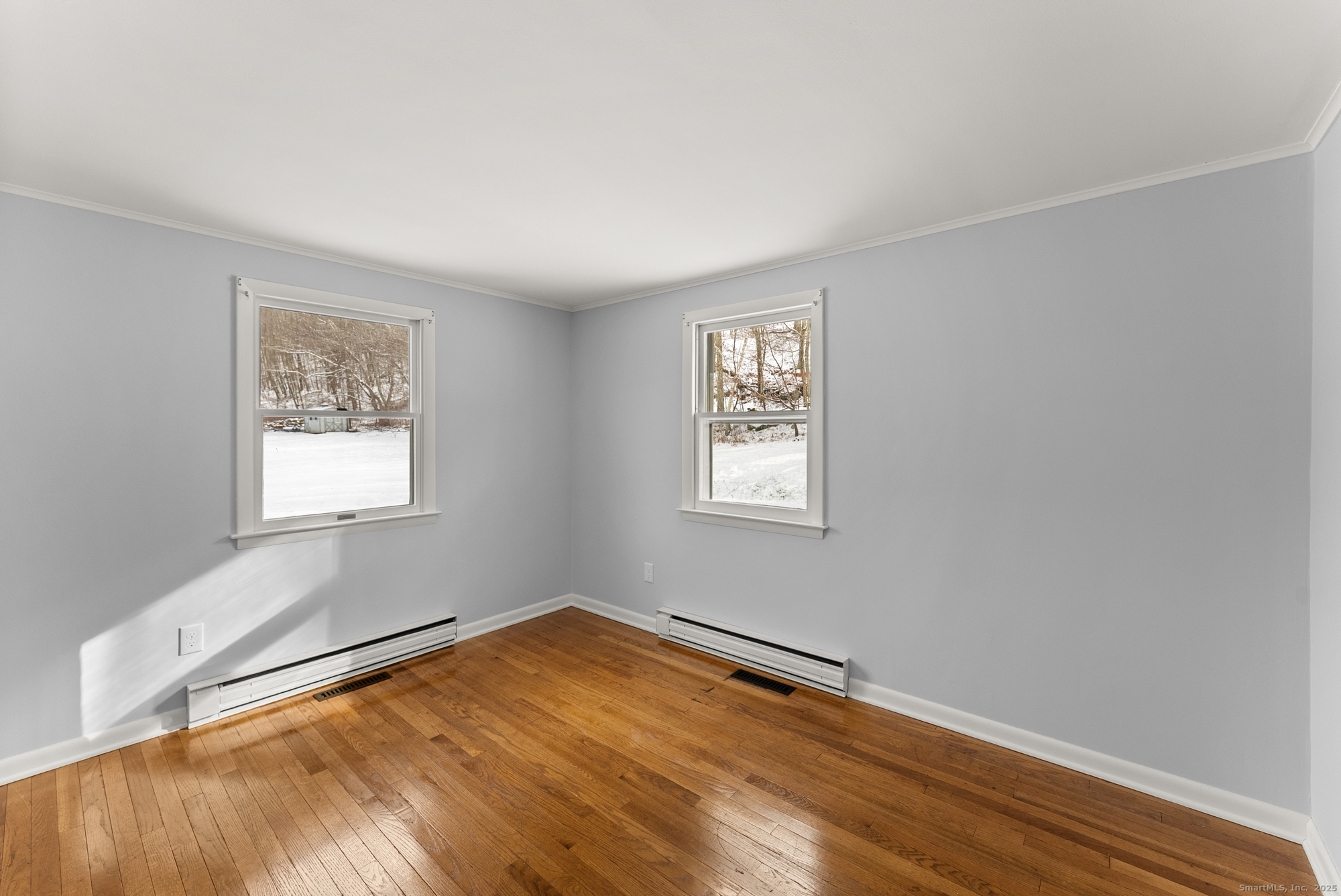 52 B Fuller Mountain Road Kent, CT 06757 - Photo 22 of 25 a view of a room with wooden floor and window