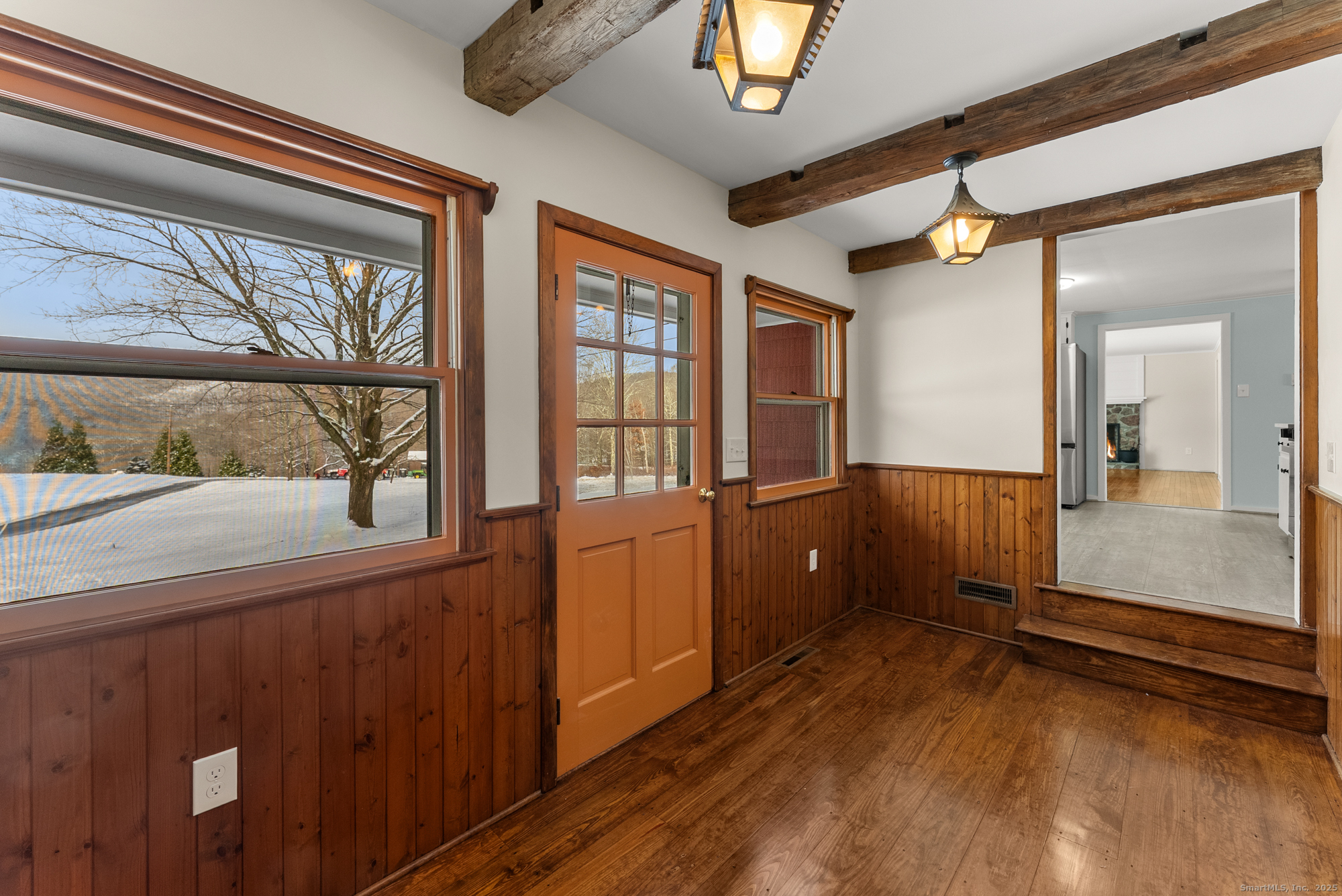 52 B Fuller Mountain Road Kent, CT 06757 - Photo 6 of 25 a view of a large room with wooden floor and windows