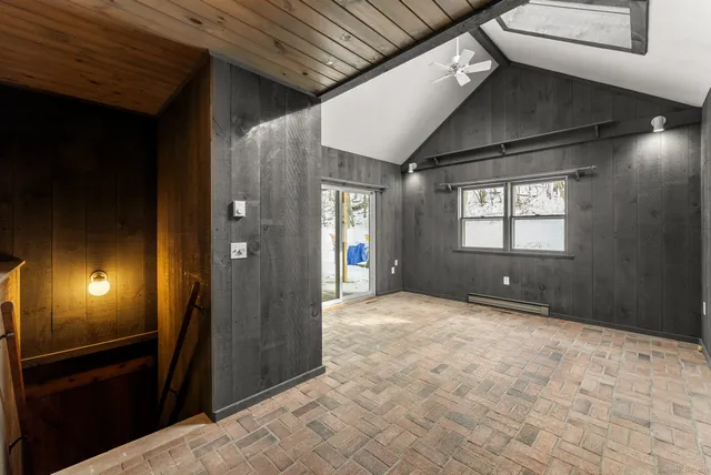 a view of an empty room and window