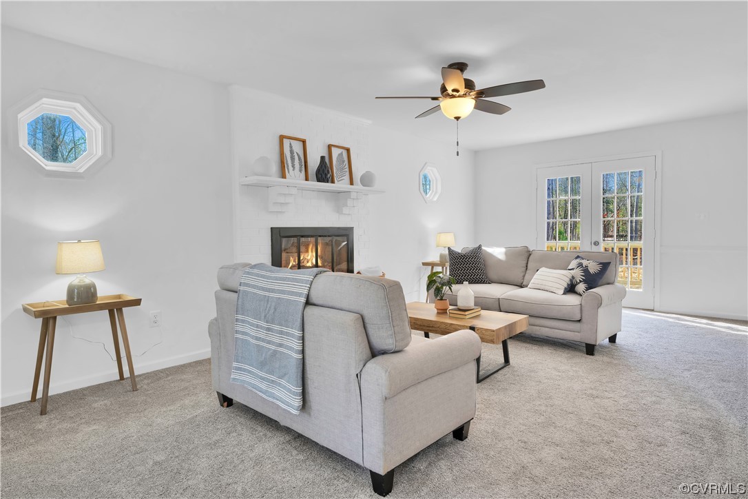 13600 Bradley Bridge Road Chester, VA 23831 - Photo 11 of 50 a living room with furniture and a chandelier