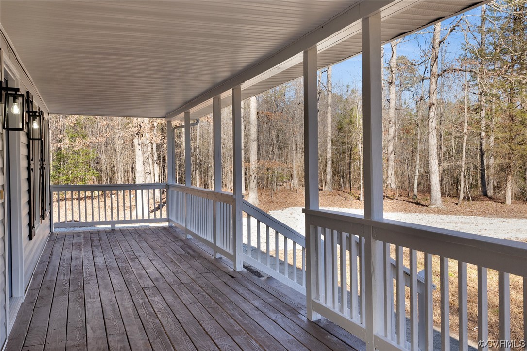 13600 Bradley Bridge Road Chester, VA 23831 - Photo 48 of 50 a view of a porch with wooden floor in front of a house