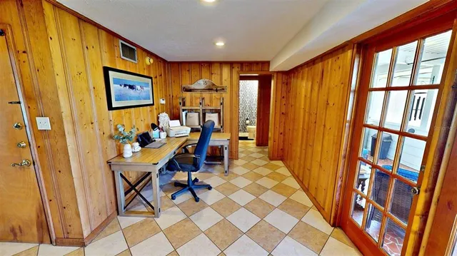 a room with a bed and a table