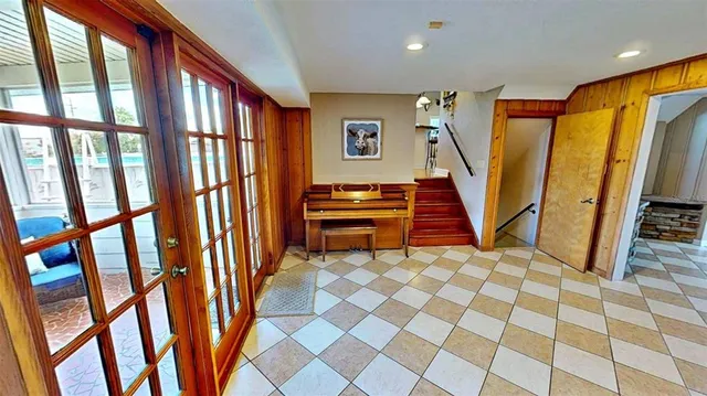 a room with furniture and a rug