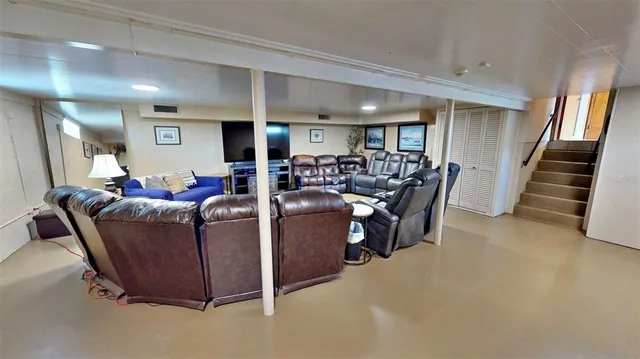 a view of a house with pool and a yard