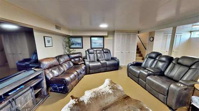 a view of a two chairs in the roof deck