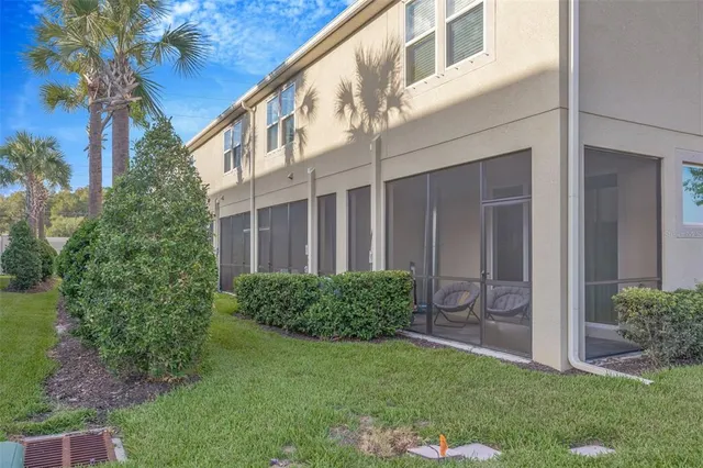 a bathroom with a shower a toilet and a sink