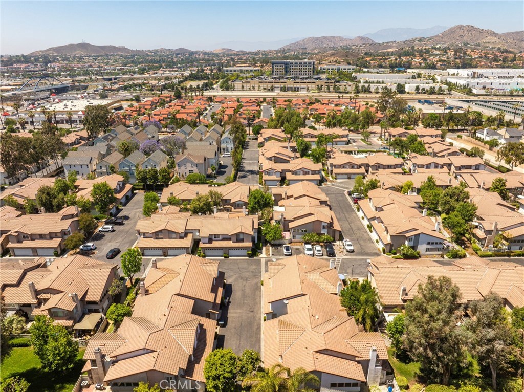 3707 Calle Curacso Riverside, CA 92503 - Photo 39 of 43 an aerial view of residential building and lake view