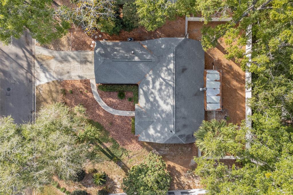 5628 Southwest 104 Terrace Gainesville, FL 32608 - Photo 31 of 31 a aerial view of a house with a yard and a fountain