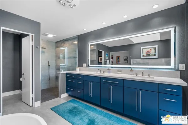 a bathroom with a toilet and a sink