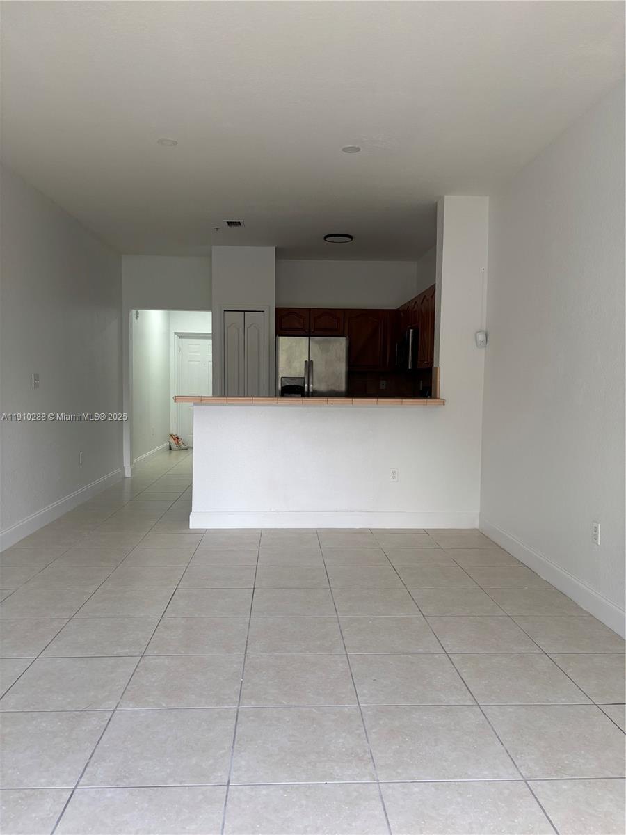 17710 Northwest 73rd Avenue, Unit 20220 Hialeah, FL 33015 - Photo 12 of 16 a view of a car garage