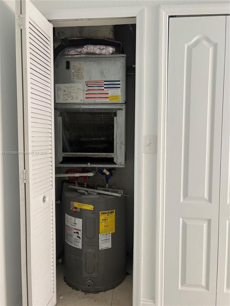 17710 Northwest 73rd Avenue, Unit 20220 Hialeah, FL 33015 - Photo 7 of 16 a view of washer and dryer