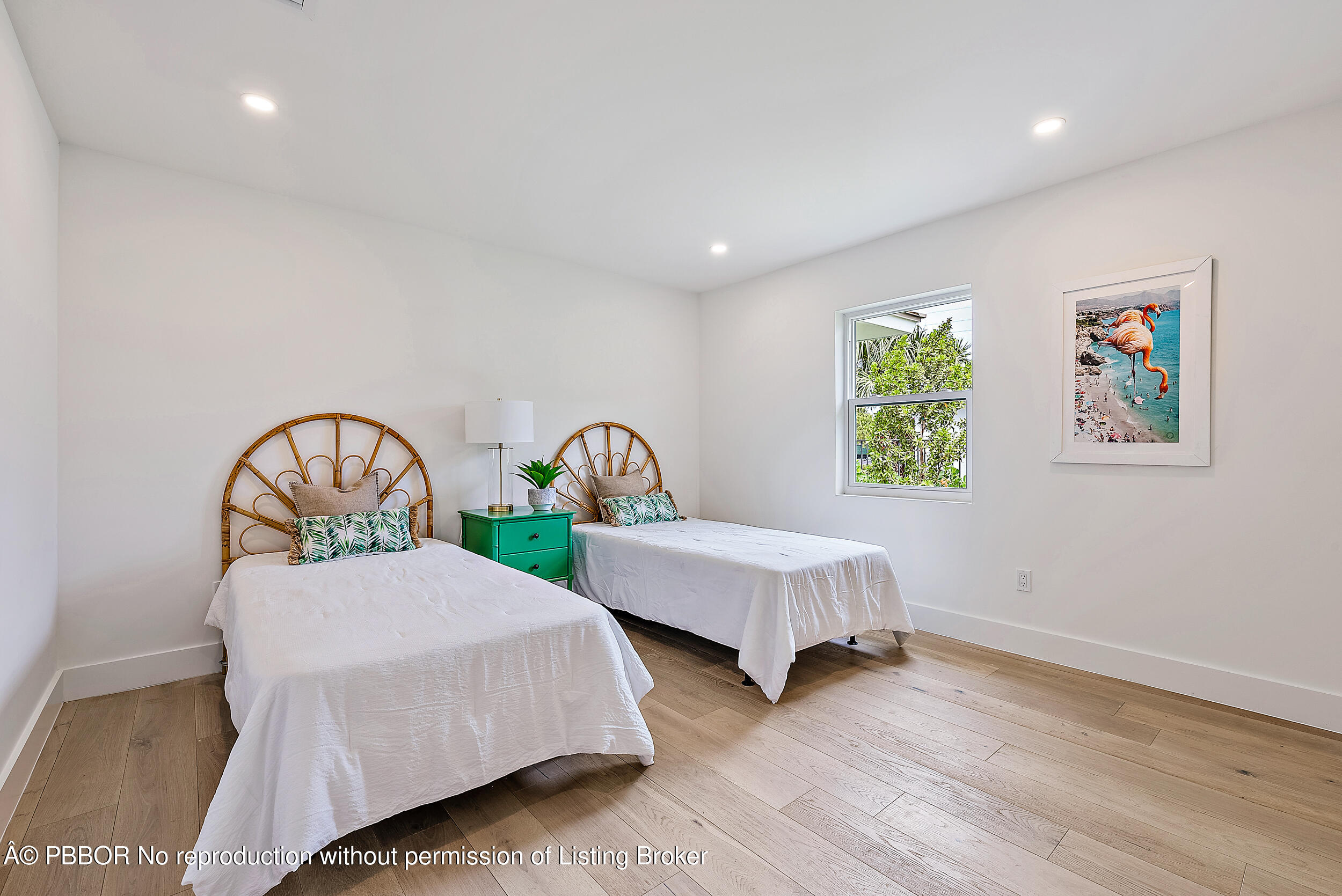 310 Edmor Road West Palm Beach, FL 33405 - Photo 27 of 32 a bedroom with two beds and a window