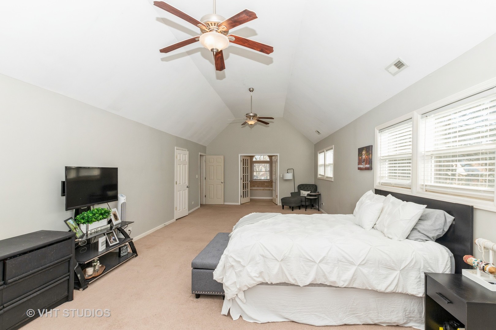 2149 Downey Road Homewood, IL 60430 - Photo 14 of 19 a spacious bedroom with a bed and a flat screen tv