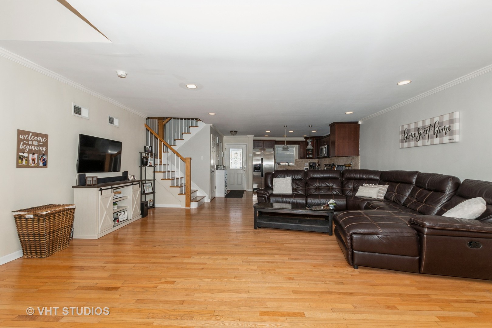 2149 Downey Road Homewood, IL 60430 - Photo 5 of 19 a living room with furniture and a flat screen tv