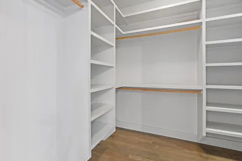 a view of an empty walk in closet