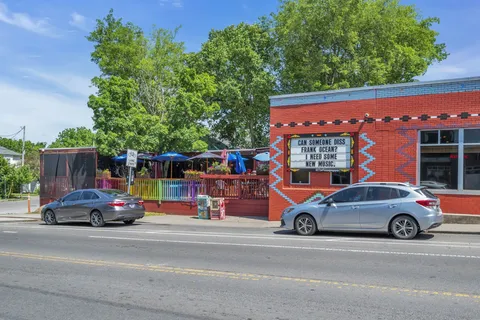 a car parked in front of a house