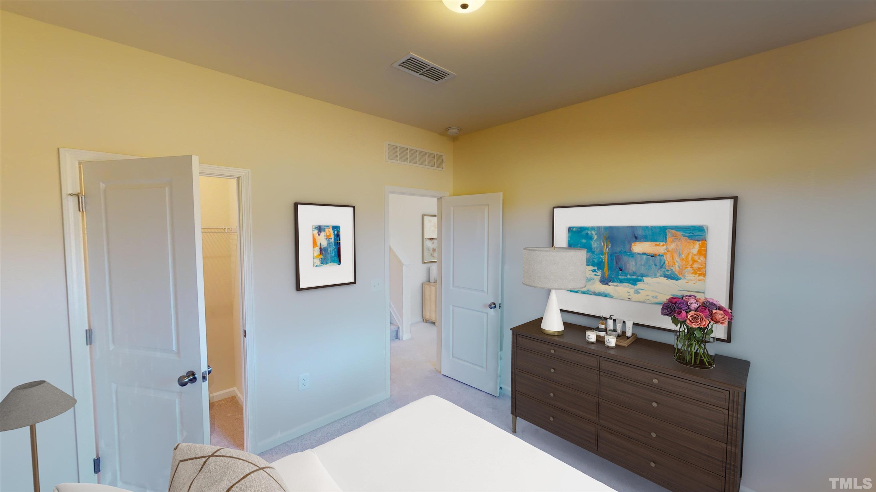 1721 Luna Way Raleigh, NC 27604 - Photo 15 of 27 a bed room with a bed and a mirror