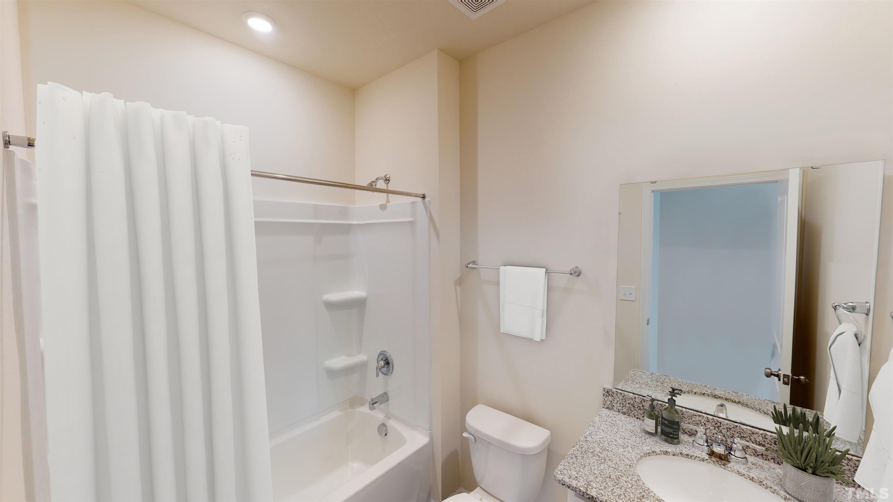 1721 Luna Way Raleigh, NC 27604 - Photo 16 of 27 a bathroom with a sink toilet and shower