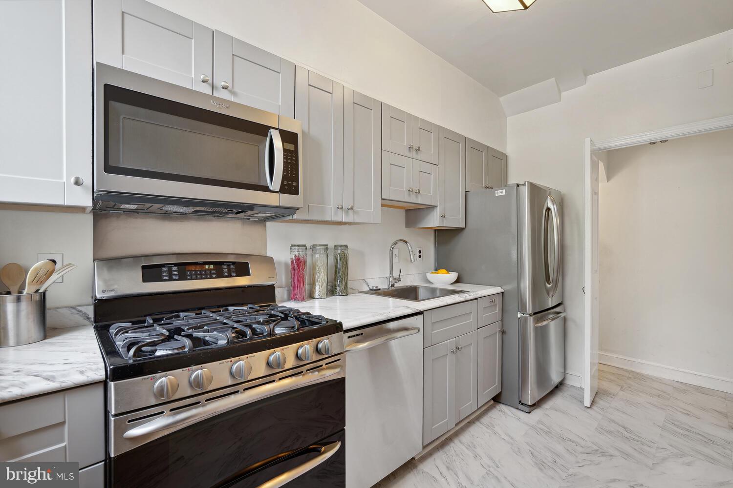 2714 27th Street Northwest Washington, DC 20008 - Photo 11 of 39 Galley kitchen with newer appliances.