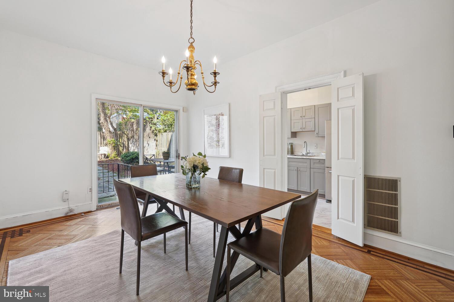 2714 27th Street Northwest Washington, DC 20008 - Photo 8 of 39 Dining Room with view of garden and kitchen.
