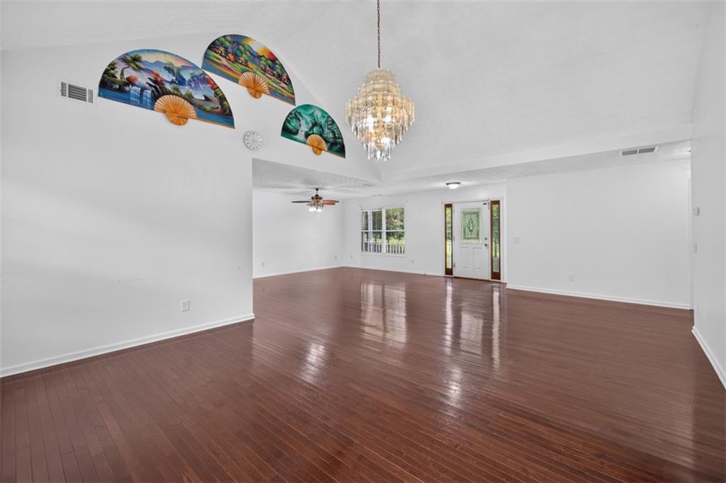 602 Pendergrass Road Winder, GA 30680 - Photo 12 of 44 a view of a room with lot of wooden floor