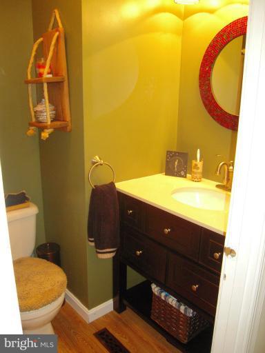 4813 Variation Road Nottingham, MD 21236 - Photo 1 of 30 a bathroom with a sink and a mirror