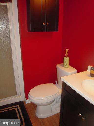 4813 Variation Road Nottingham, MD 21236 - Photo 14 of 30 a bathroom with a toilet a sink and a mirror