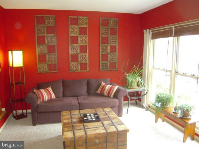 4813 Variation Road Nottingham, MD 21236 - Photo 20 of 30 a view of a livingroom with furniture and a potted plant