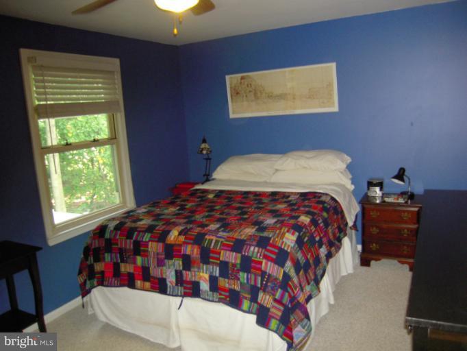 4813 Variation Road Nottingham, MD 21236 - Photo 3 of 30 a bedroom with a bed and a window