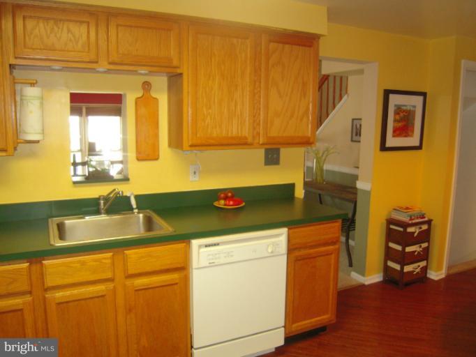 4813 Variation Road Nottingham, MD 21236 - Photo 26 of 30 a kitchen with a sink and cabinets