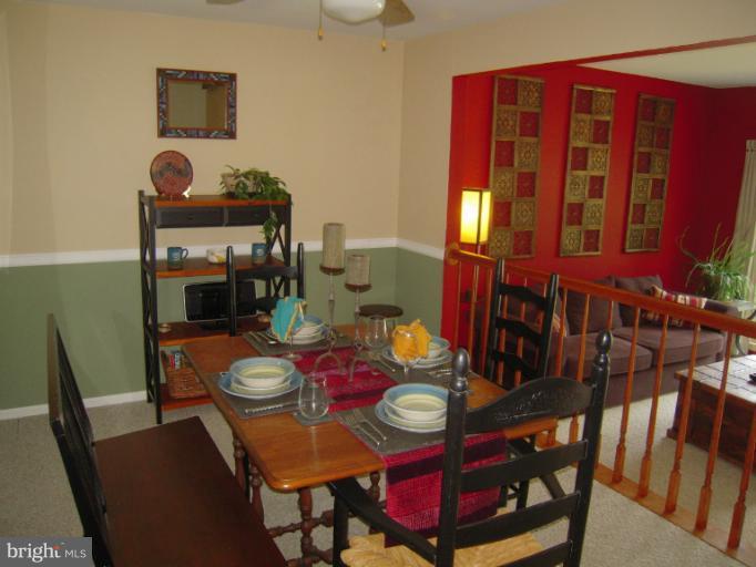 4813 Variation Road Nottingham, MD 21236 - Photo 7 of 30 a view of a dining room with furniture and chandelier