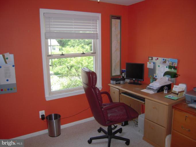 4813 Variation Road Nottingham, MD 21236 - Photo 8 of 30 a view of a workspace with furniture and a window