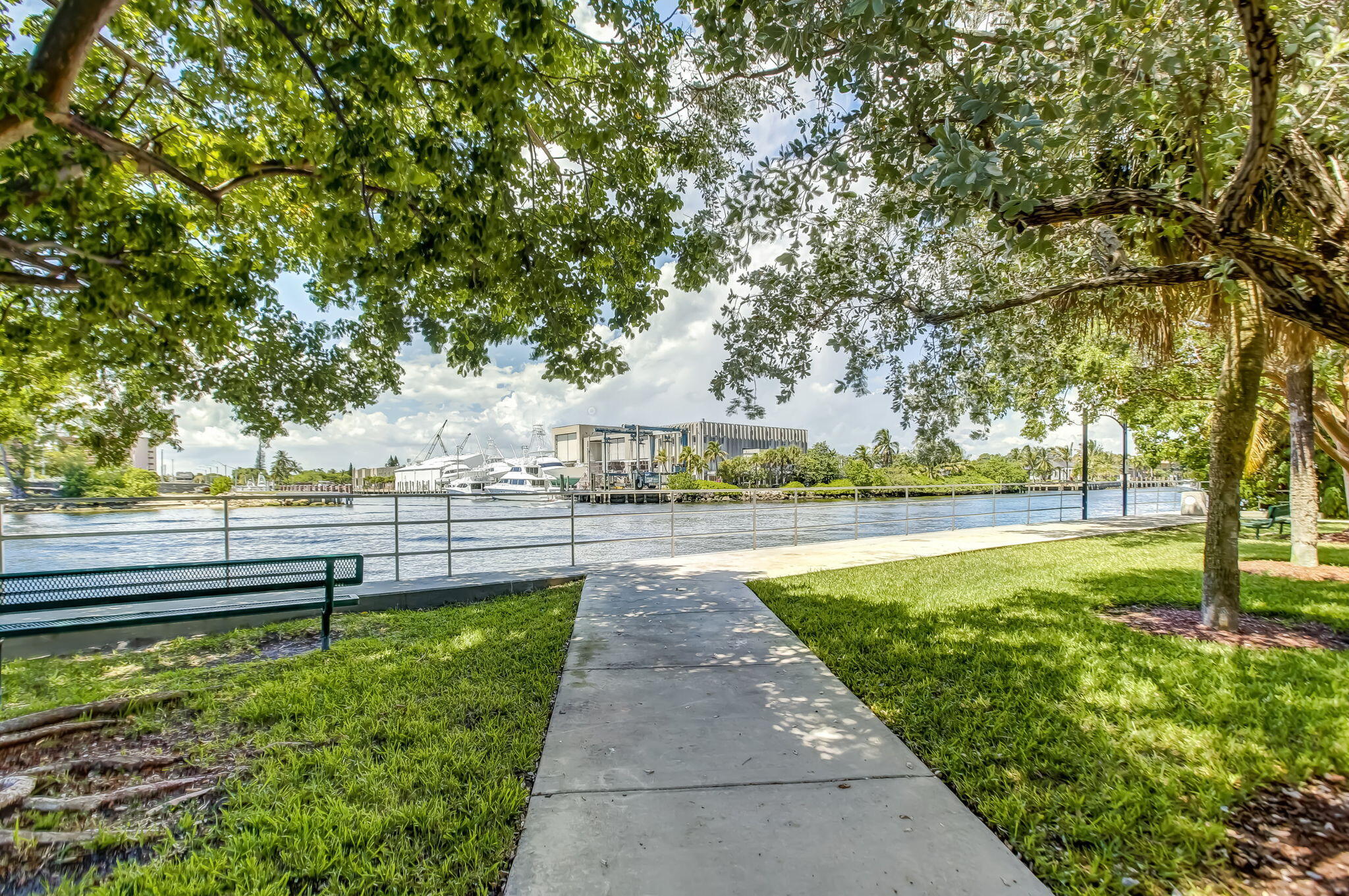 1505 North Riverside Drive, Unit 507 Pompano Beach, FL 33062 - Photo 36 of 39 a view of lake with a table and chairs