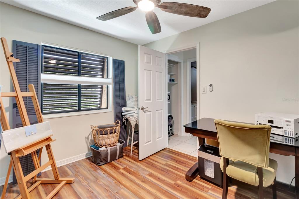 1908 Oak Circle Tavares, FL 32778 - Photo 20 of 28 a livingroom with workspace and a window