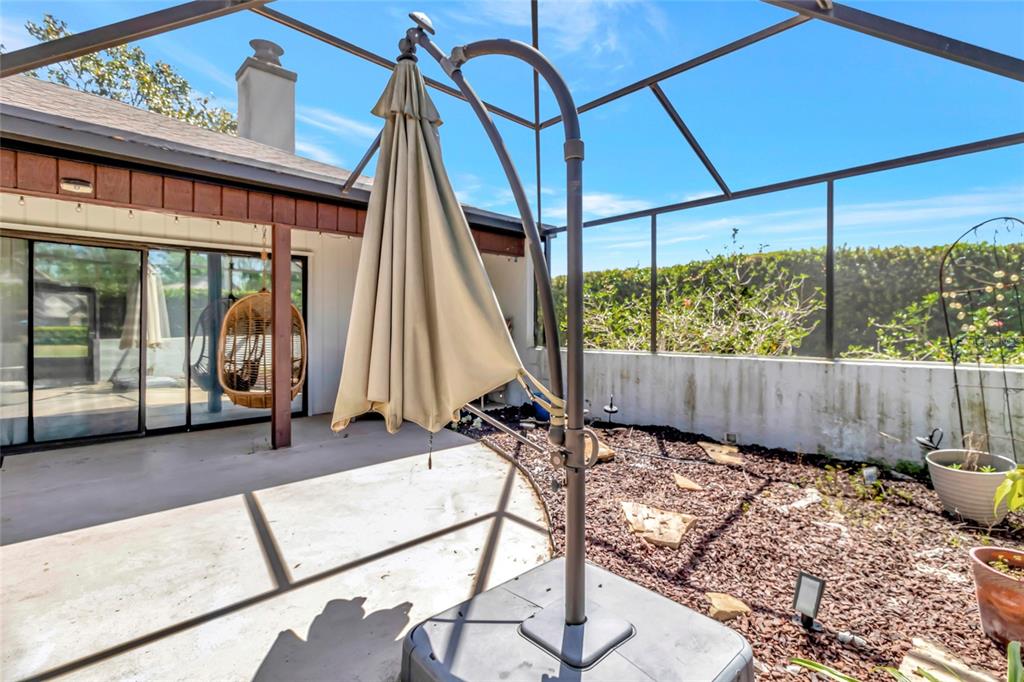 1908 Oak Circle Tavares, FL 32778 - Photo 22 of 28 a view of an chairs and table in the balcony