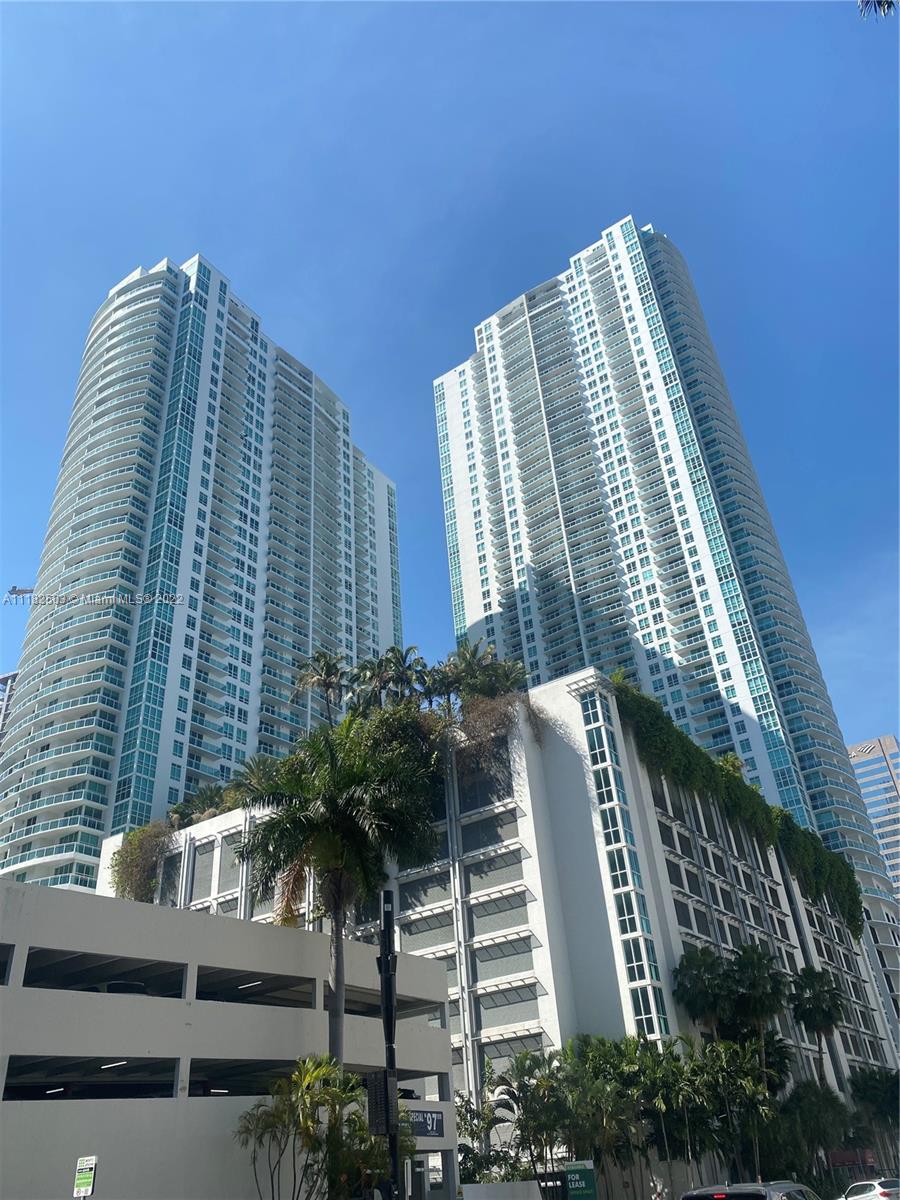 950 Brickell Bay Drive, Unit 602 Miami, FL 33131 - Photo 1 of 16 a view of a tall building